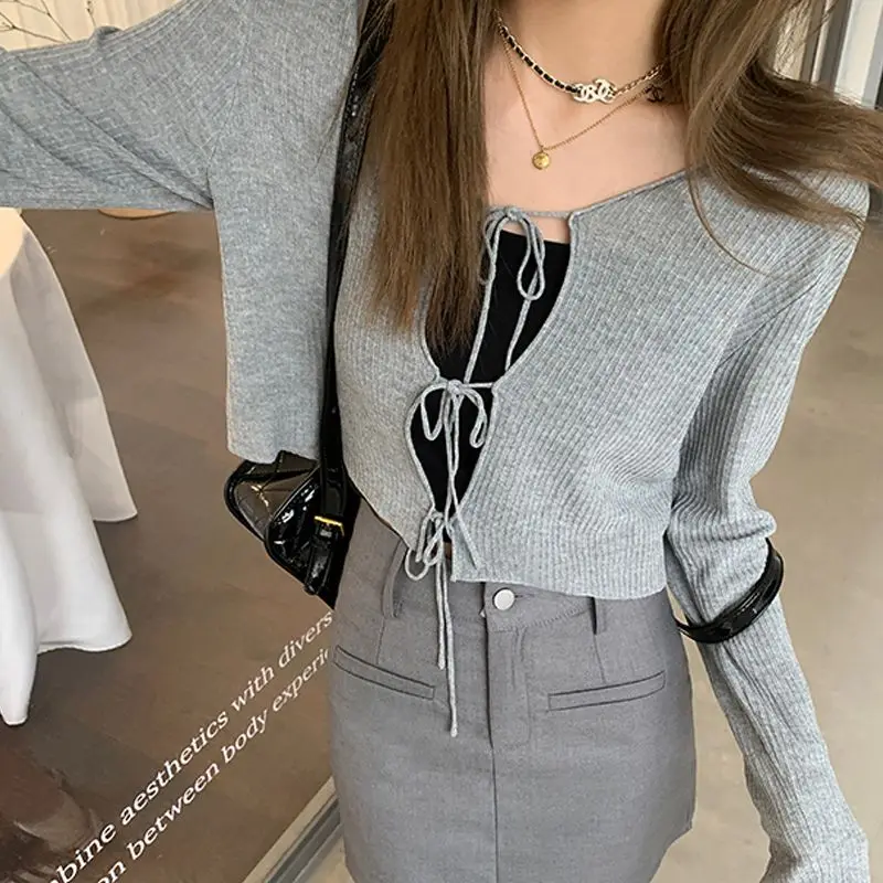 Pure Spicy Girl Design Sense Niche Strap Slightly Transparent Long Sleeved Cardigan Women's Thin Sunscreen Knitted Top