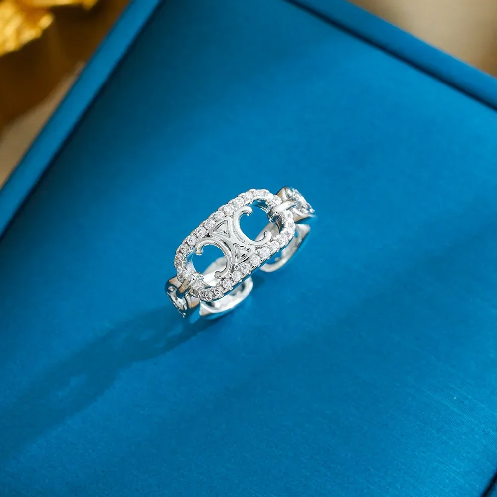 

A unique and elegant Arc de Triomphe gold electroplated women's ring and a hollowed-out zircon light luxury couple's ring