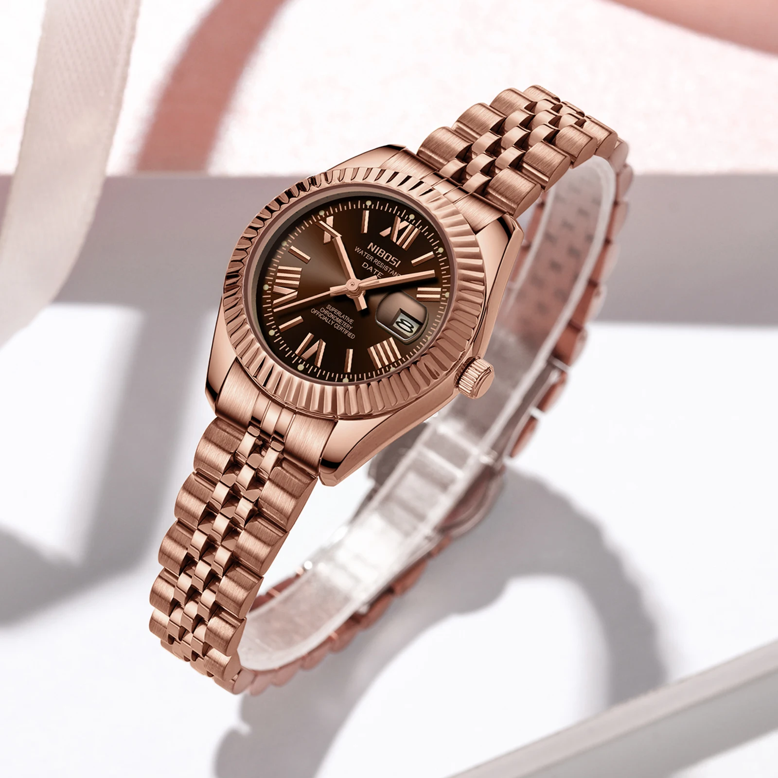ساعة NIBOSI النسائية التناظرية كوارتز مقاومة للماء للسيدات مع تاريخ أنيق ذهبي أنيق فاخر من الفولاذ المقاوم للصدأ