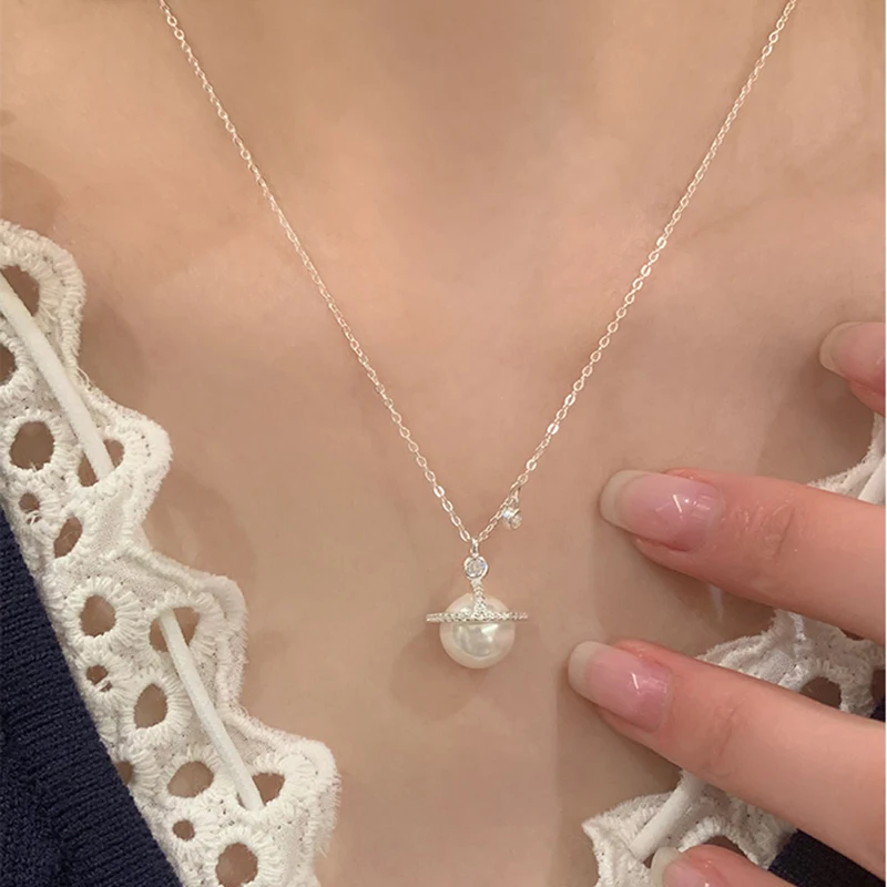 S925 فضة جميلة زحل قلادة المختنق قلادة بسيطة اللؤلؤ قلادة المرأة هدية الزفاف بوتيك غرامة مجوهرات
