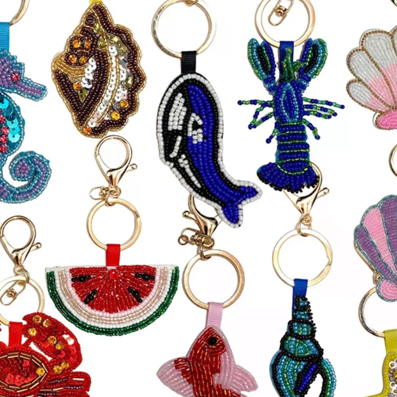 

Decorative Sequin Embellished Crab, Shell, Conch, and Starfish Keychain with Rhinestones for Bag