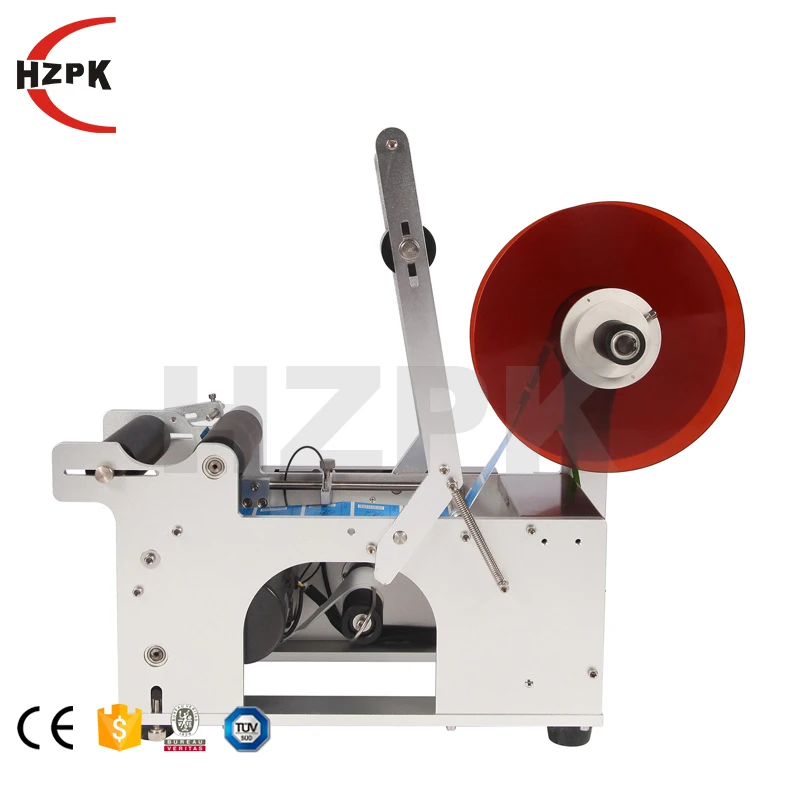 HZPK MT-50 กึ่งอัตโนมัติเดสก์ท็อปรอบแก้วสัตว์เลี้ยงขวดคู่มือ Self กาวเครื่องติดฉลากราคาขวด 20-120 มม.อลูมิเนียม