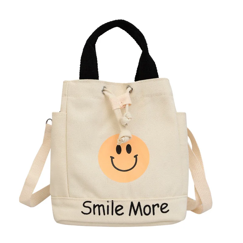 Nuova borsa di tela con viso sorridente borsa da donna alla moda borsa a secchiello retrò europea e americana borsa a tracolla Casual all\'ingrosso