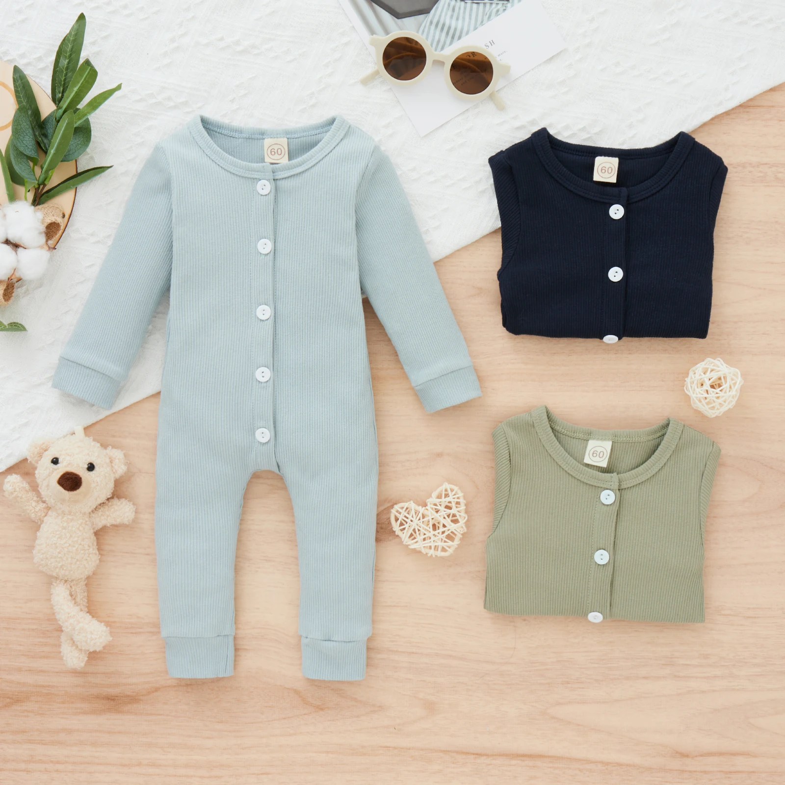 

Spring Boys And Babies Aged 0-2 Years Old Daily Casual Round Collar Solid Color Buttons Fine Pit Strip Jumpsuit