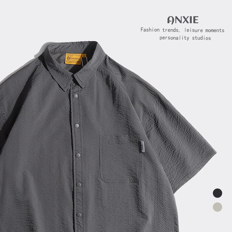 

Мужская свободная рубашка с коротким рукавом от гонконгского бренда: модная летняя одежда для защиты от солнца. Рекомендуемый товар.