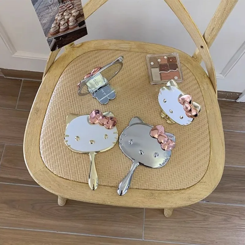 サンリオハローキティ猫ミニミラーアニメ漫画かわいいポータブルハンドル女の子折りたたみプリンセスミラー装飾子供の誕生日ギフト