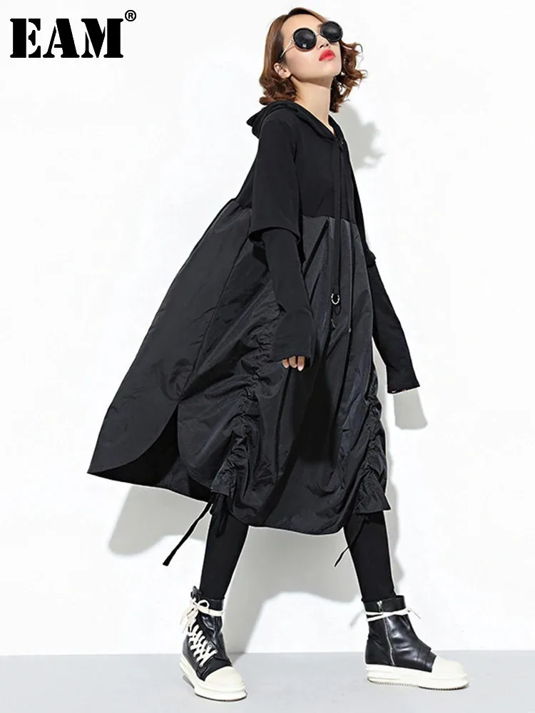 [EAM] Women Black Drawstring Hollow Out Big Size Irregular Dress New Hooded Long Sleeve Fashion Tide Spring Autumn 2025 JD076