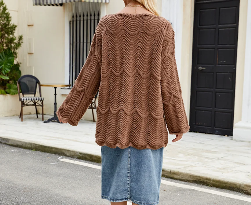 

Autumn New Hollow Shoulder Long Sleeved Knitted Sweater for Women with Slanted Collar, Elegant and Fashionable Knitted Sweater