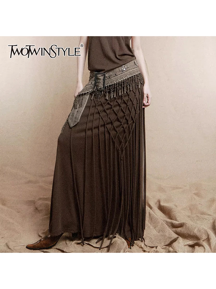 

TWOTWINSTYLE Solid Spliced Tassel Loose Skirts For Women High Waist Temperament Patchwork Belt Skirt Female Fashion Style New