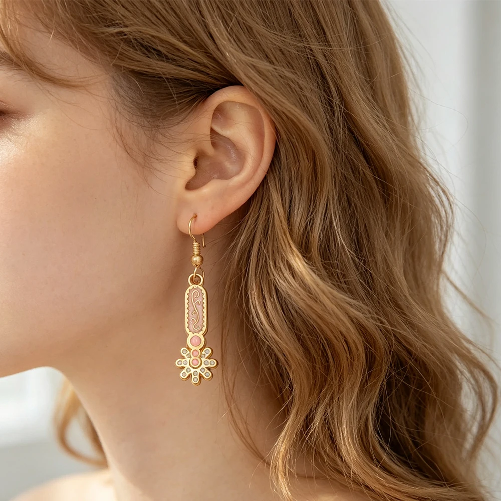 Gold-edged pink enamel daisy long earrings, vintage gentle sweet style, versatile for daily commuting, women's dangling earrings