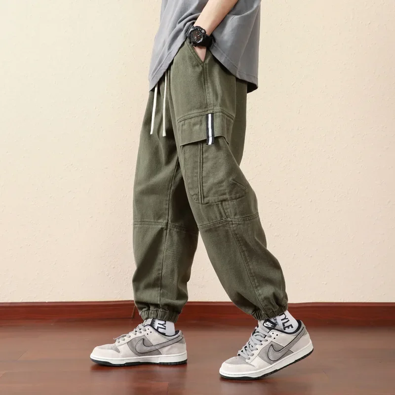 2024 Spring New Korean Version of Tooling Large Size Casual Loose Cotton Multi-bag Pants Fashion Small Foot Pants Men