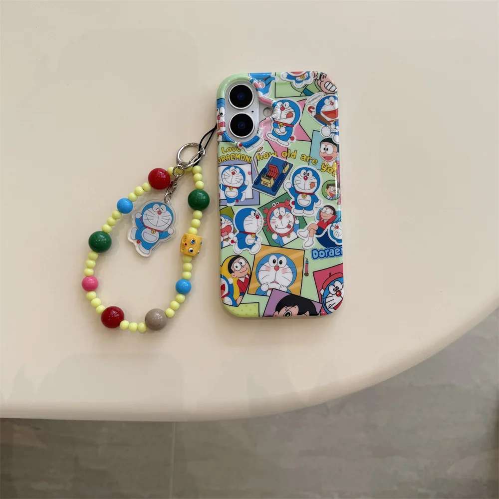 Funda de teléfono Doraemon kawaii de dibujos animados japoneses iPhone 13 14 15 16 Pro Max funda de lujo cadena de moda nueva funda a prueba de golpes para 16