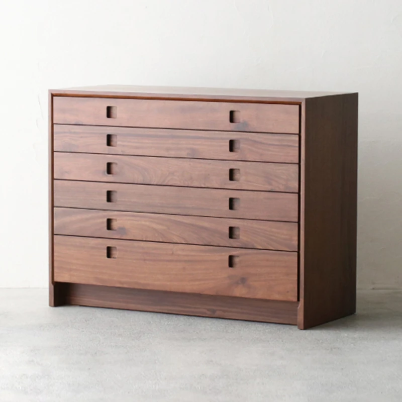 Antique storage at the end of log bed in all solid wood storage cabinet of black walnut six drawers