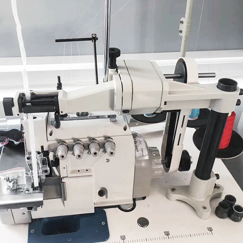 MDK60 Automatic Tape Feeder Automatic elastic tape feeding equipment for protective clothing overlock sewing machines