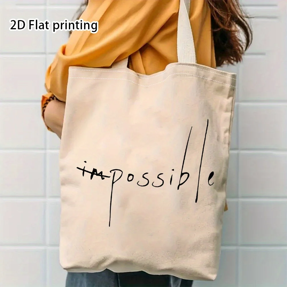 A The word 'impossible' Pattern printed canvas tote bag, suitable for daily use, shopping, school, and travel