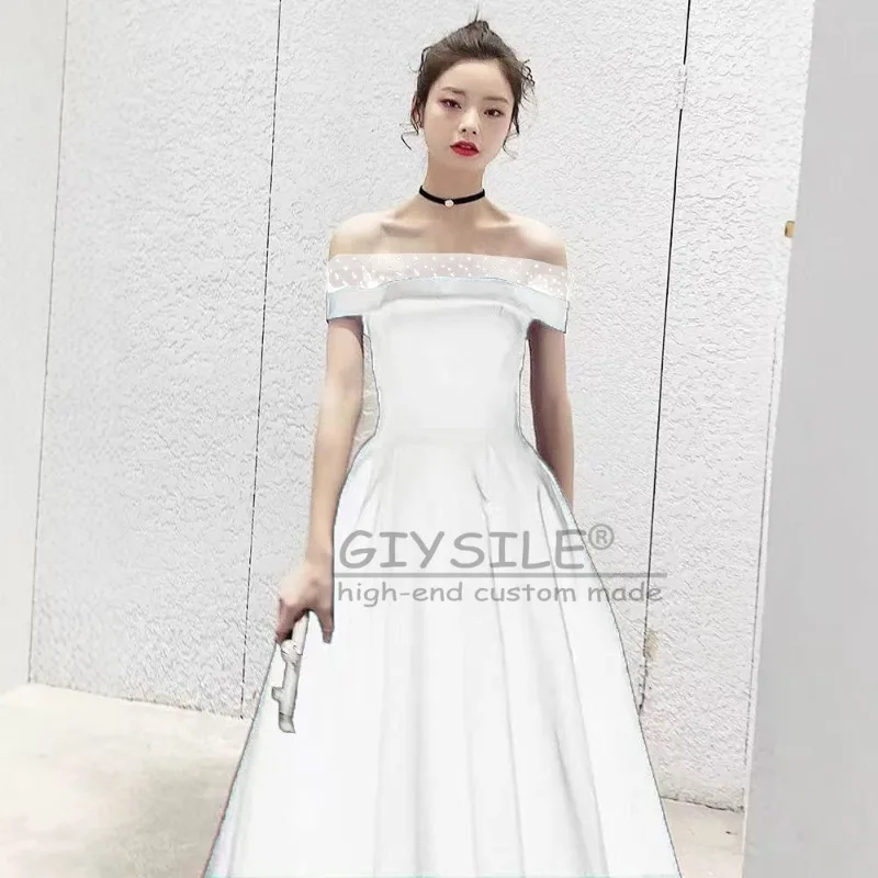 GIYSILE Abito da sera nero sexy moda personalizzato Top a tubo Banchetto lungo femminile Temperamento di fascia alta Tracolla sottile sul retro