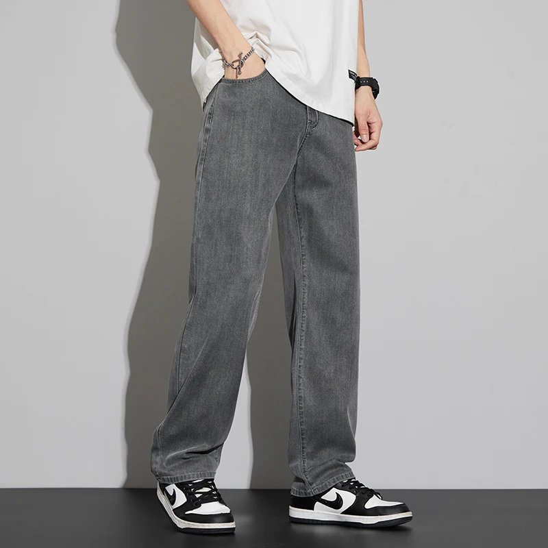 2025 Lyocell verano pantalones vaqueros finos de los hombres de cintura alta sueltos cómodos rectos elásticos pantalones vaqueros de negocios pantalones masculinos