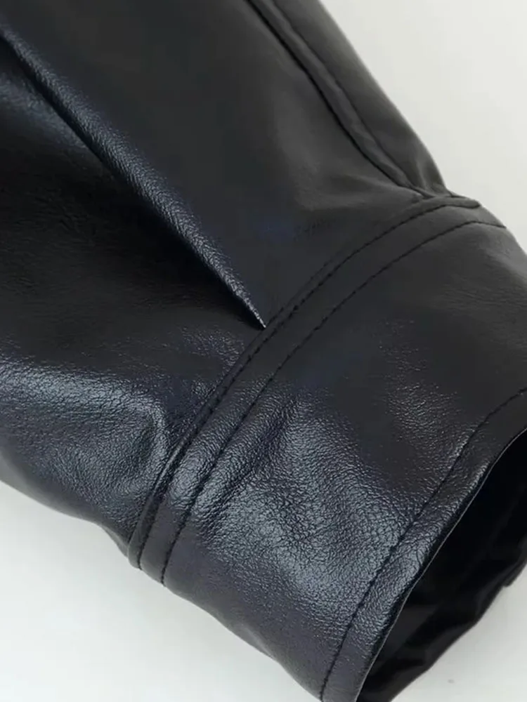 سترة نسائية موضة شتاء 2025 جديدة فضفاضة من الجلد الصناعي بأكمام طويلة وياقة واقفة سترة جلدية للنساء