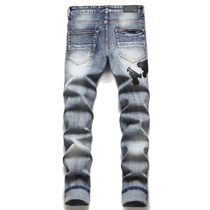 Men's jeans with ripped patches, trendy stretch, slim fit, and versatile men's pants