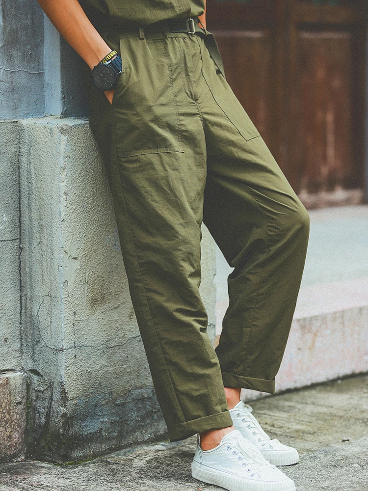 Retro japoński kombinezon roboczy, luźne spodnie męskie, modna odzież codzienna, uniwersalny styl dla młodych mężczyzn.