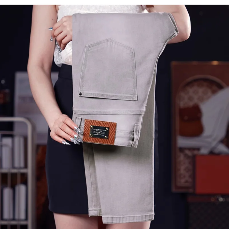 

Summer thin light gray jeans for men, slim fit with small feet, fashionable trend, casual, light luxury pants