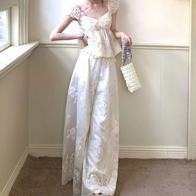 

Французская двухсекционная кружевная рубашка на шнуровке, повседневные брюки с высокой талией и широкими штанинами, женский летний новый модный костюм 2025 г.