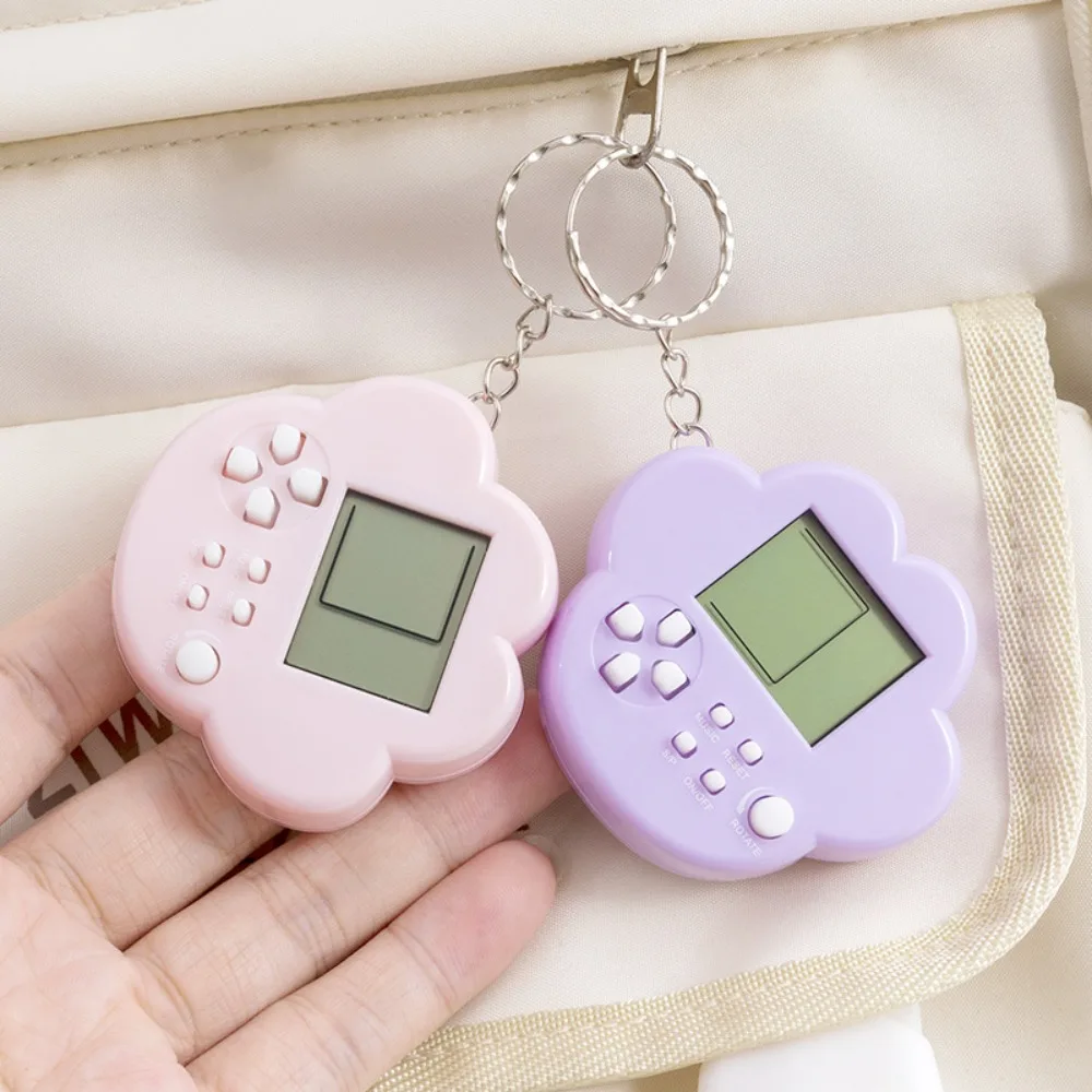 

Милый брелок-игровая приставка в виде лапы кошки и собаки, ретро-ностальгическая портативная видеоигровая консоль, портативный брелок-подарок для детей