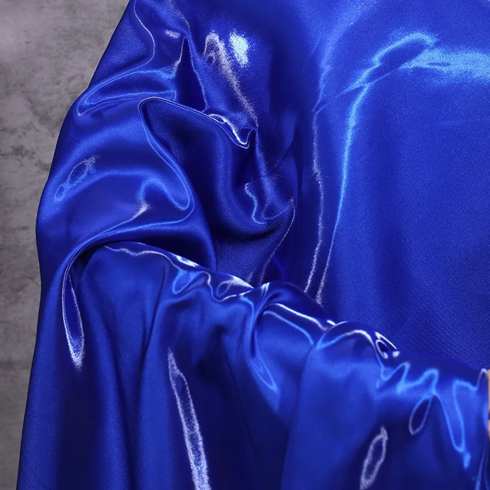 

Luxury Polyester Liquid Water Satin Fabric Thickened Natural Reflective Clothing Fabric Flash Crisp Cloth Dress Windbreaker Coat