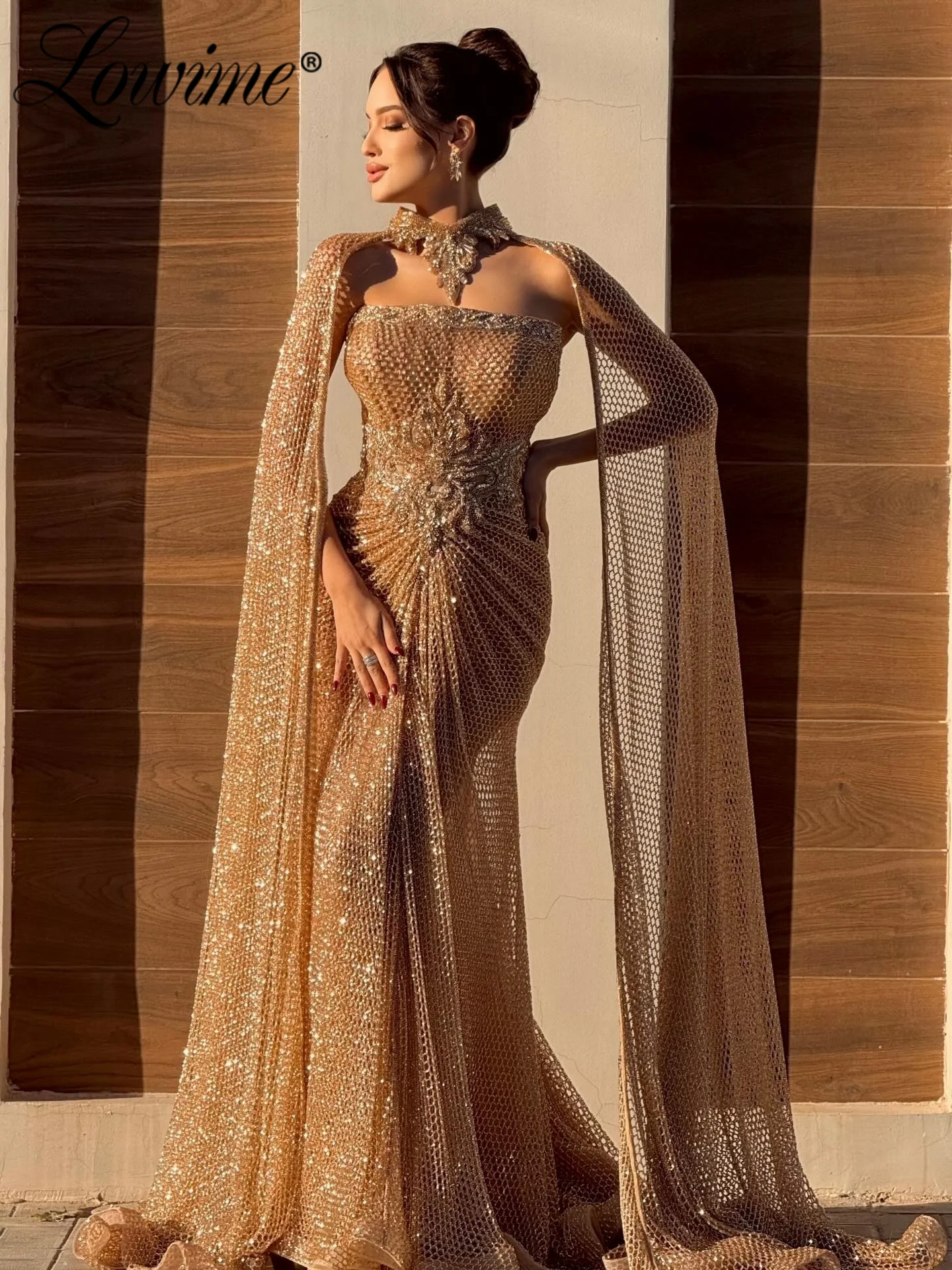 

Gold Strapless Celebrity Dresses Customized Cape Sleeves Mermaid Prom Dress 2026 Sparkling Beaded Crystals Luxury Evening Gowns