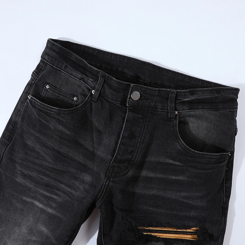 

European and American high-quality fashionable new men's jeans with perforated patches washed with water, nostalgic black jeans,