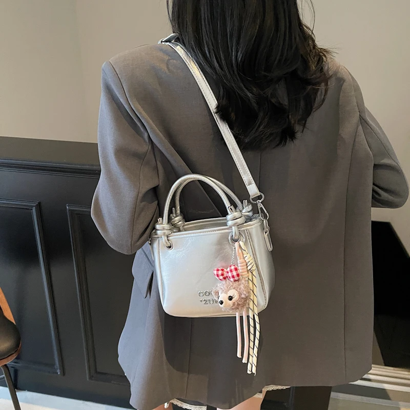 

Elegant Leather Clutch Bag Mini for Women, Vintage Paris Designer Inspired, Simple and Stylish with Letter Logo, Leisure Use