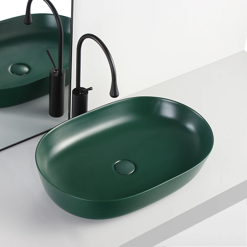 

Modern dark green black matte countertop basin oval bathroom washbasin household wash basin ceramic countertop basin