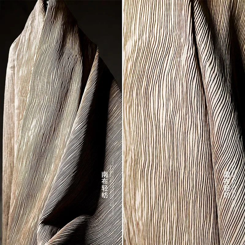 Camel colored corrugated paper pleated with a crisp texture composite pleats creative art designer fabric