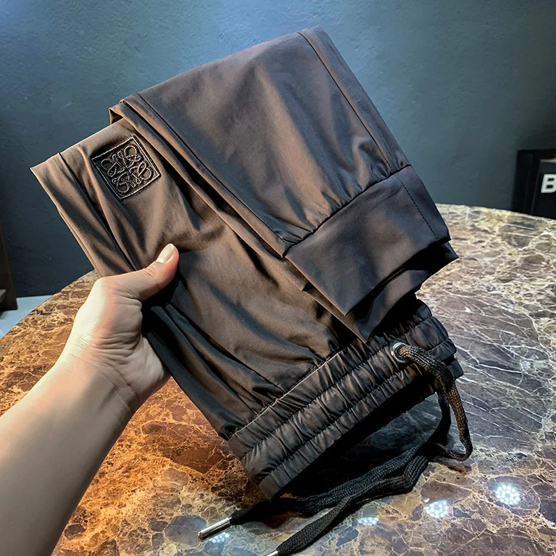 

Light luxury ice silk pants for men's summer new fashion trend brand high-end embroidery sports quick drying casual pants