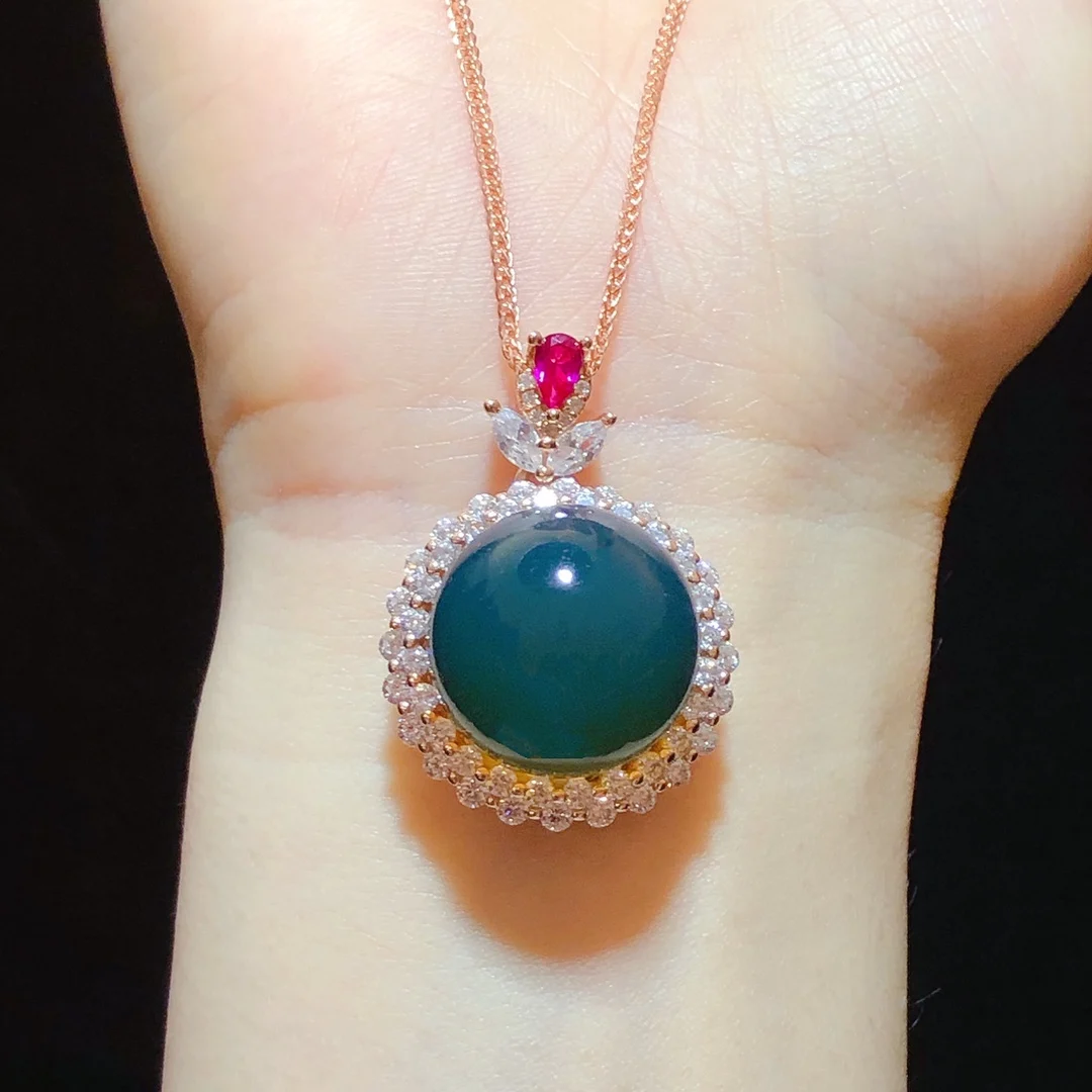 

Unique sunflower design natural blue amber pendant 16mm with ruby ​​decoration sterling silver necklace women's gift