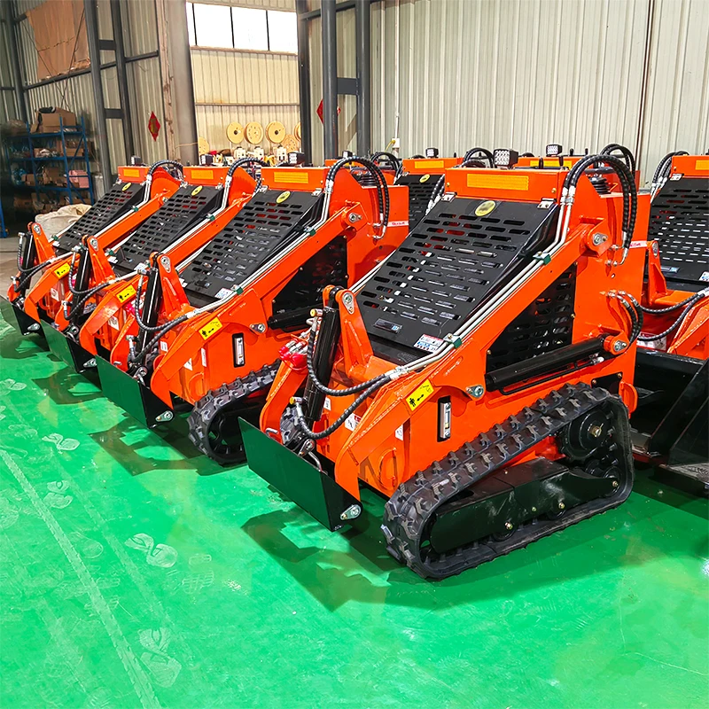 تسليم سريع جرافة انزلاقية صغيرة مع مرفق محرك المسار الزاحف تتحرك محمل صغير جودة عالية جرافة انزلاقية التوجيه