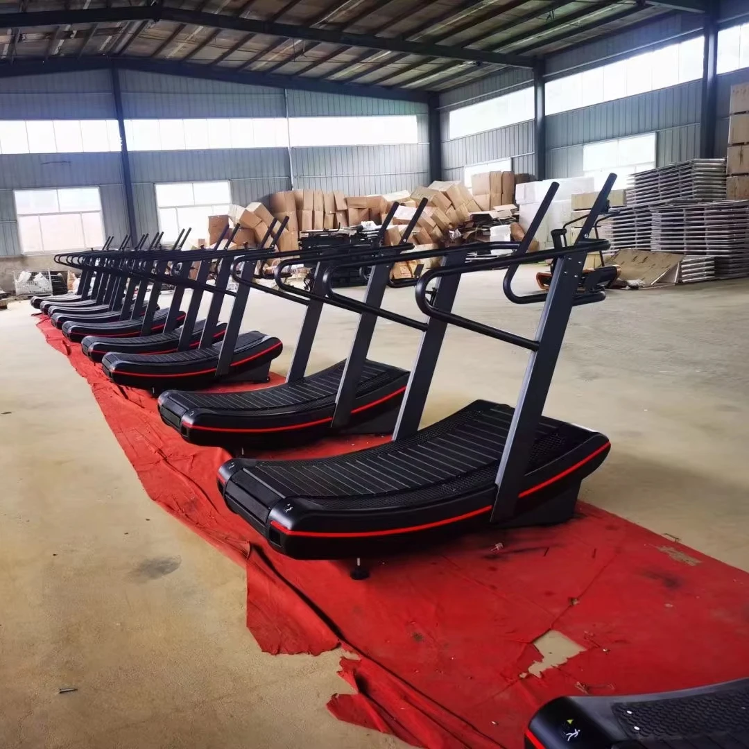 جهاز سير منحني لصالة الألعاب الرياضية التجارية غير الكهربائية لعام 2025 - آلة تشغيل يدوية ميكانيكية ذاتية التوليد لمراكز اللياقة البدنية