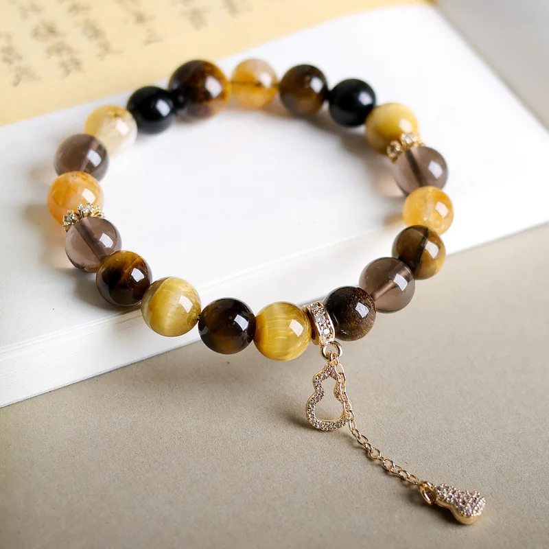 Original stone yellow tower crysta obsidian tiger eye and gold bracelet – a collection of fine jew
