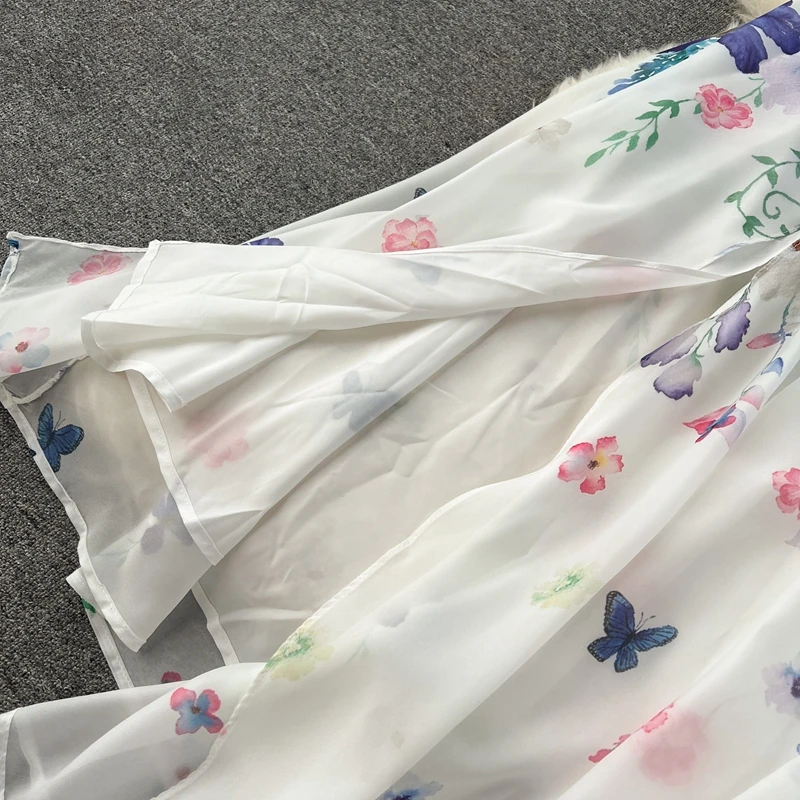 Eén schouder lotusblad rand taille cinched bedrukte chiffon jurk lente 2025, nieuwe vakantiestijl lange jurk