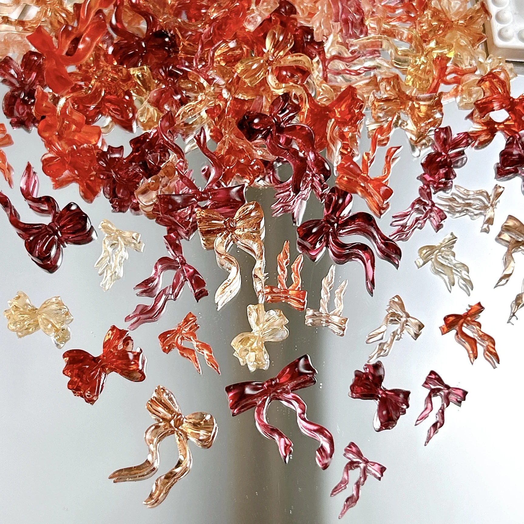 50PCS Novelty Creative Jelly Bow Resin Nail Charms Transparent Four-colors Wave Bow Tie Nail Art Decorations for DIY Sweet Nails