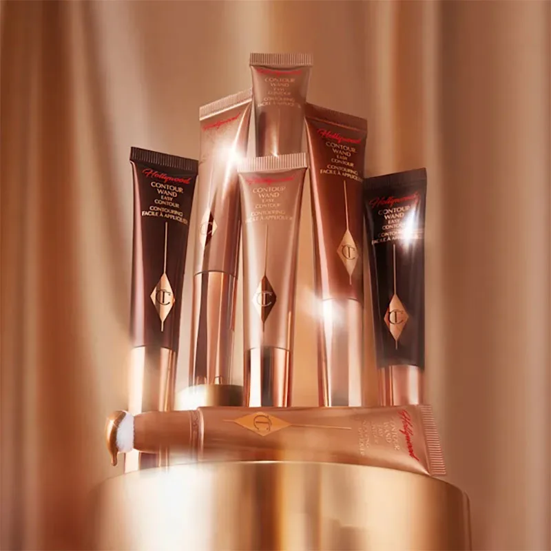 Charlotte Tilbury - Iluminador Líquido en Barra, Colorete en Polvo, Colorete en Barra con Cojín de Aire, Maquillaje Cosmético