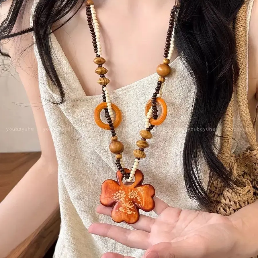 

Bohemian Wood Bead Celestial Lariat Star Moon Pendant Garment Locked Accent Must Pair Clothing 2025 Cottagecore Jewelry Revival