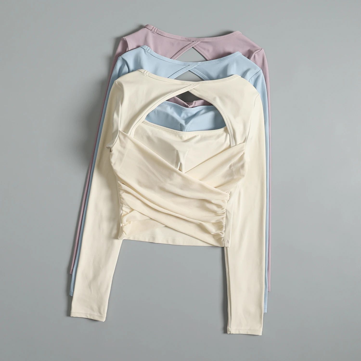 Yogakleding met holle rug, dames herfst alles-in-één hardlooptrainingtop met lange mouwen, modieuze afslankende sport-fitnesskleding