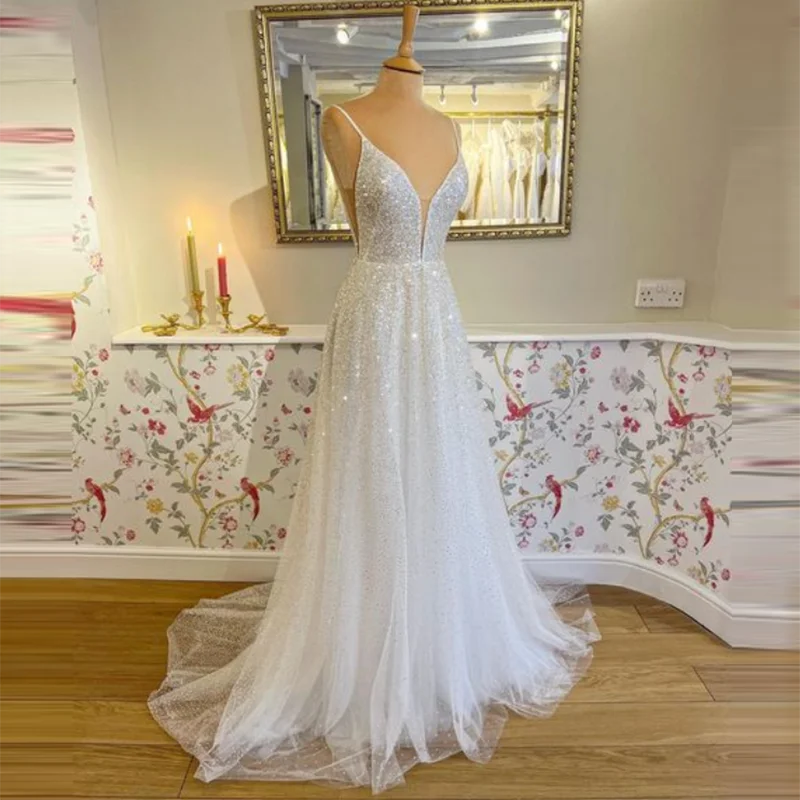 فساتين زفاف تول لامع 2026 مثيرة أشرطة سباغيتي بدون ظهر فساتين العروس على شكل حرف a بدون أكمام طويلة فستان حفلات الزفاف الحديث #1