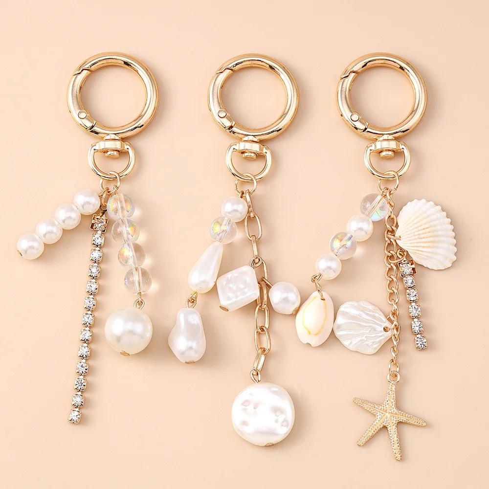 Neuer Premium-Muschel-Imitationsperlen-Schlüsselanhänger, goldfarben, Seestern-Link, 3 Stile, Rucksack, Handy, zum Aufhängen von Ornamenten, Mädchen als Geschenk
