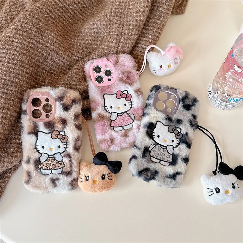 Luxury winter fluffy hand warmer Plush Leopard Hello Kitty phone case for iPhone 16 15 14 13Pro Max Cartoon KT Furry Wrist Strap