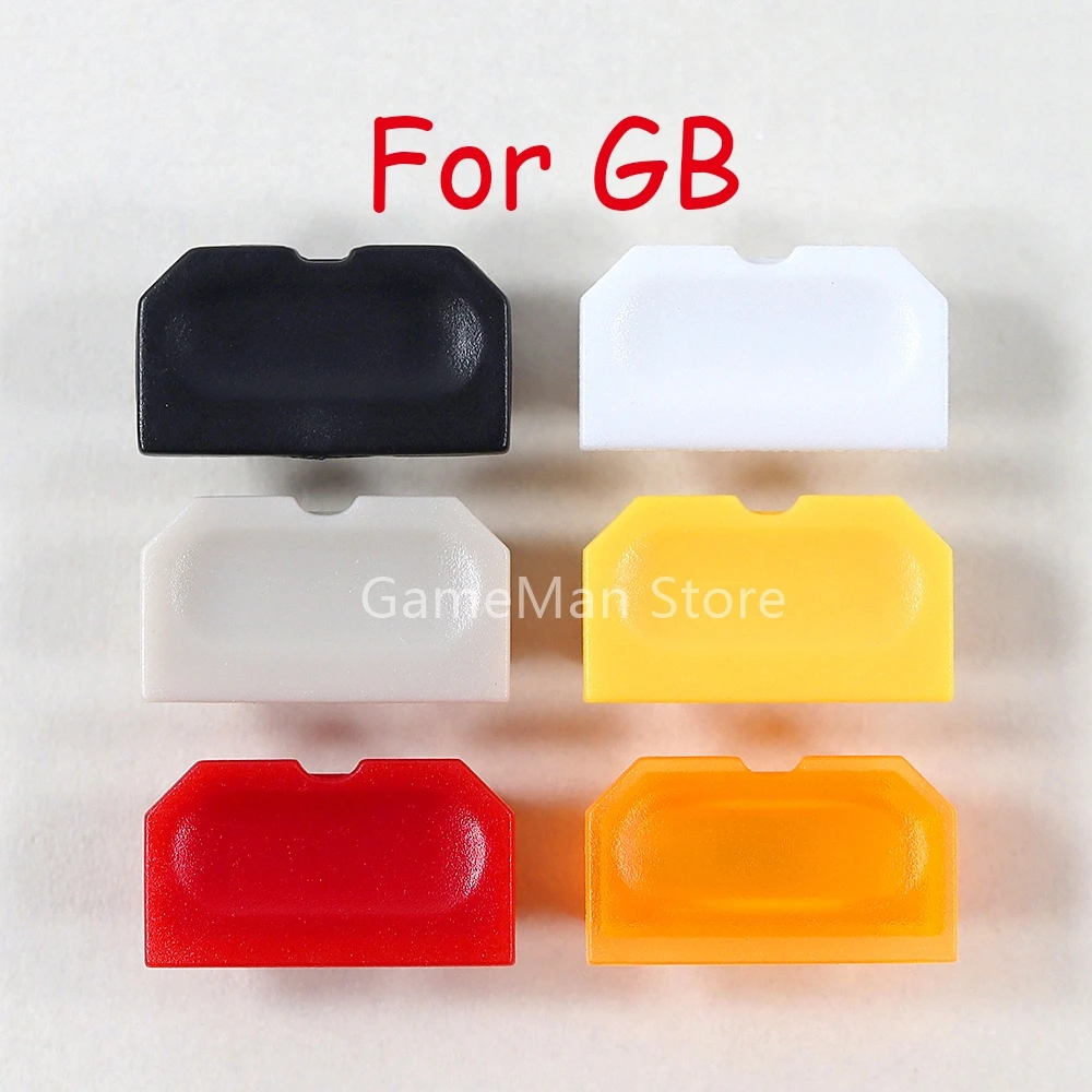 2 ชิ้นหลากสีฝุ่นสําหรับ Gameboy GB เกมคอนโซลเปลือกฝุ่นปลั๊กปุ่มพลาสติกสําหรับ GB DMG 001