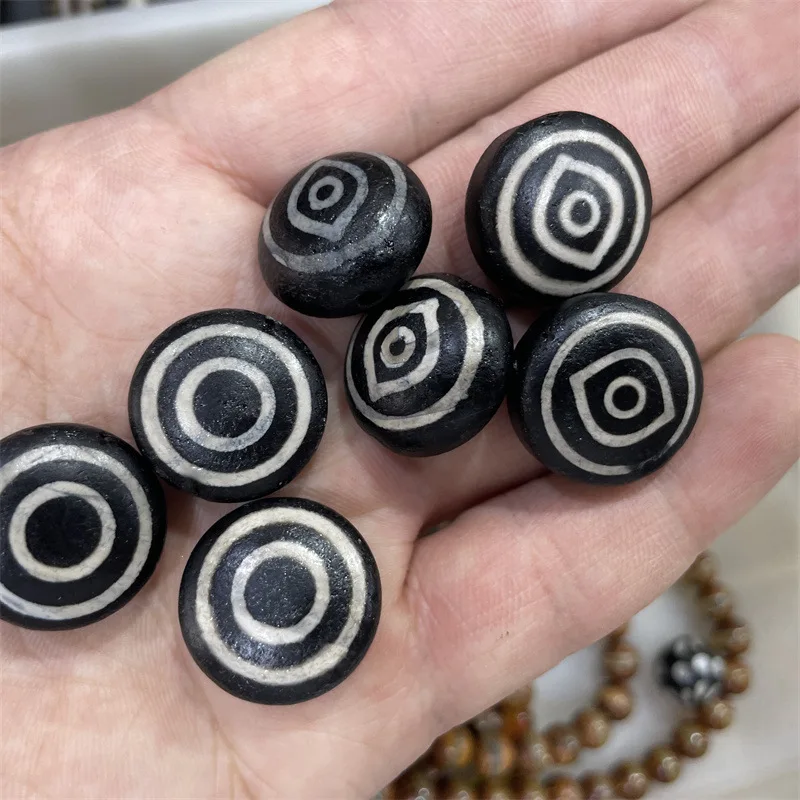 , Aged, Eye-Shaped Dzi And Agate ; Red, Auspicious Round Beads With A Black Circle