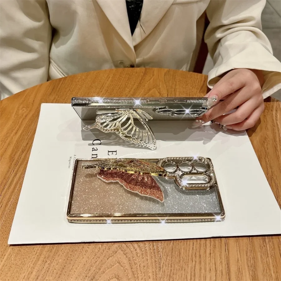 فراشة قوس حامل بريق الحال بالنسبة لسامسونج غالاكسي S25 الترا S24 FE S23 S22 زائد A26 A36 A52 A53 A12 الماس غطاء الموضة