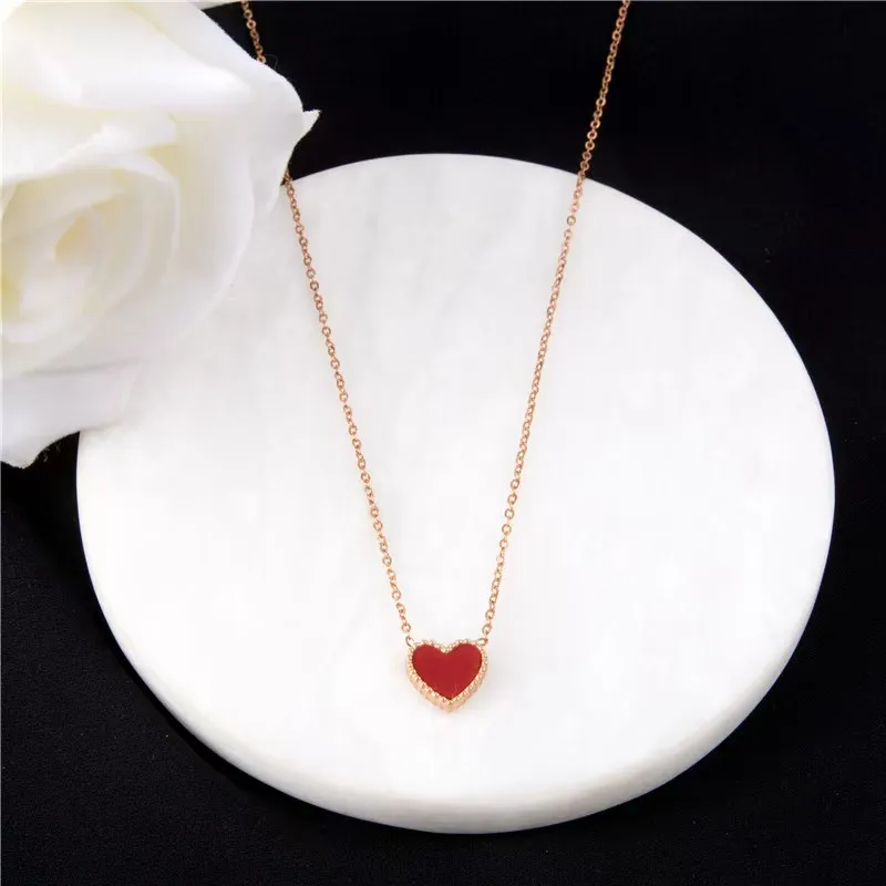 Double-sided heart-shaped love pendant titanium steel necklace female plated 18K rose gold collarbone chain fashion hundred with